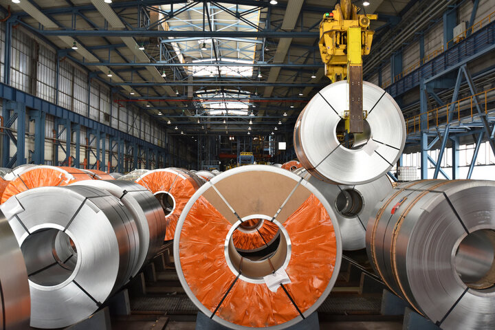 Steel coils and rolling-mill line in a metals plant